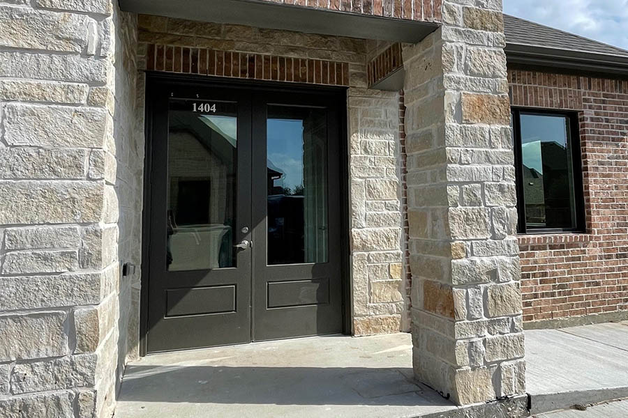 Carrollton, TX Insurance - Jeff Van Matre Insurance Agency Stone Office Located in Carollton, Texas on a Beautiful Day